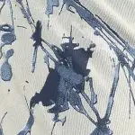 Detail of the stretch cotton Splash fabric in cream and blue tones, used for Monvic VIOLET women's climbing pants.